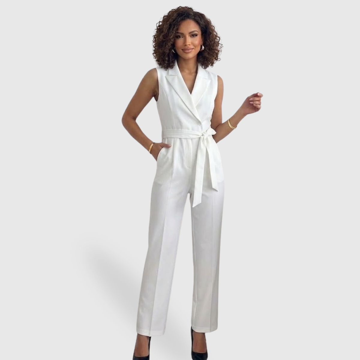 Tuta elegante da donna con pantaloni a vita alta, senza maniche e dal taglio fluido
