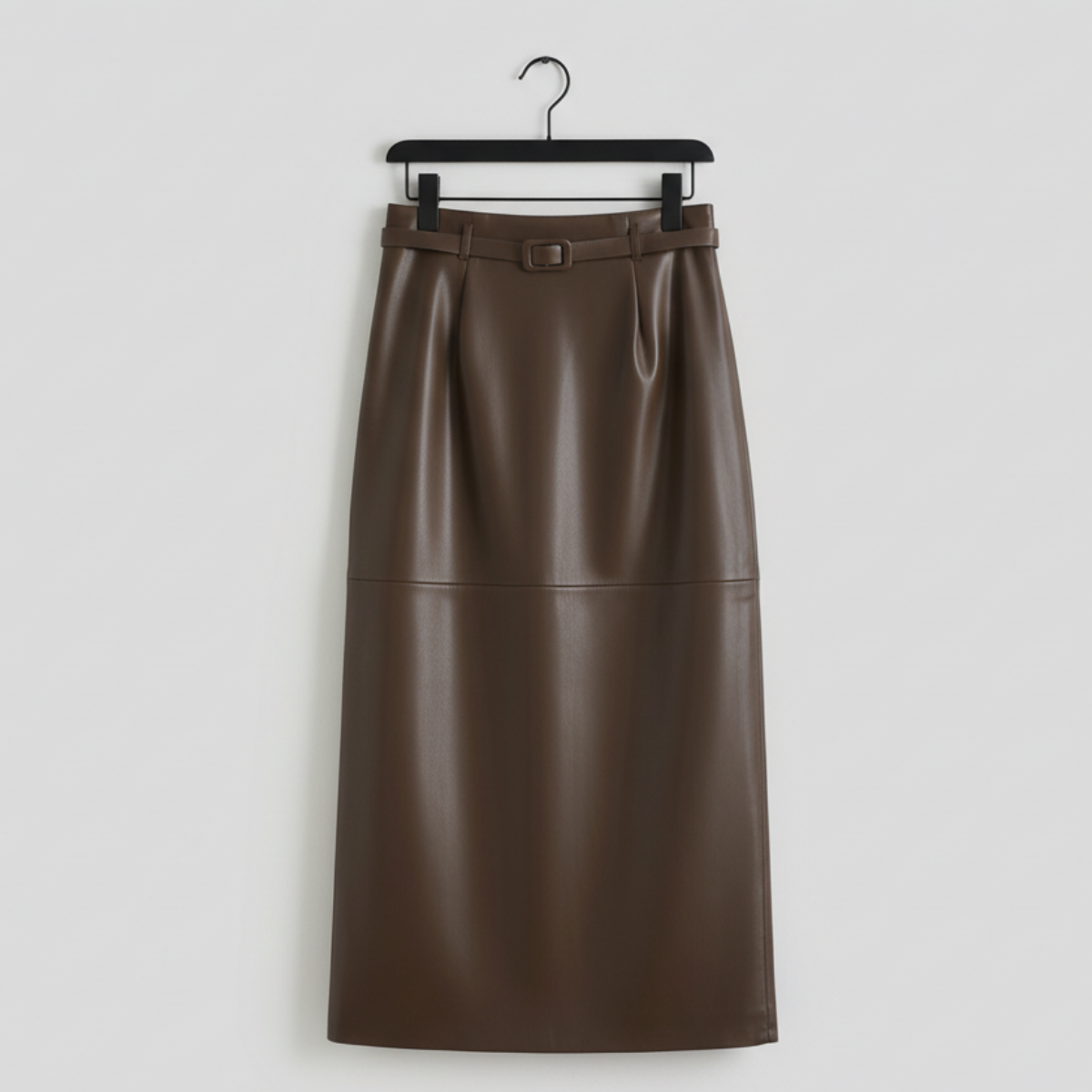 Women's high-waisted faux leather skirt with buckle belt