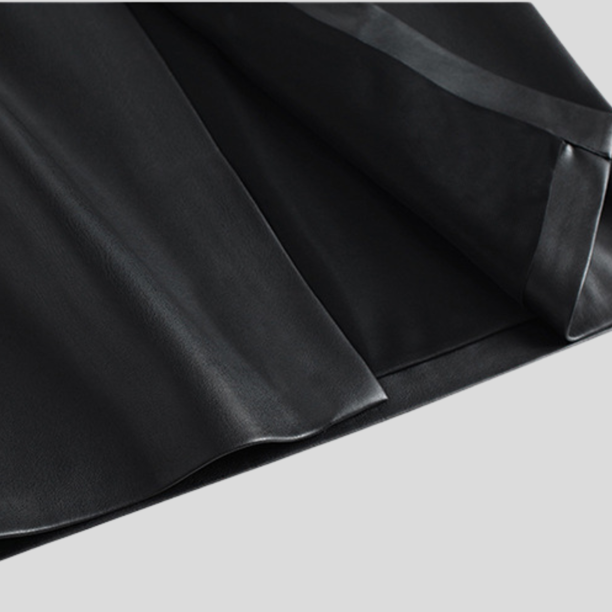 Women's high-waisted faux leather skirt with buckle belt