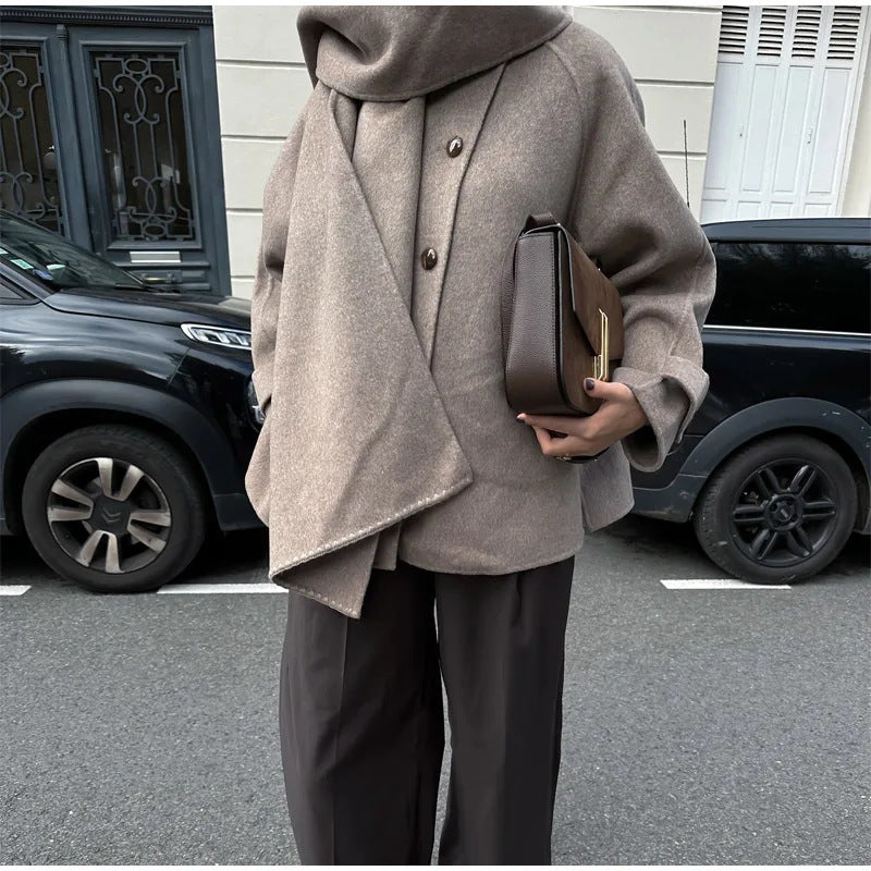 Women's oversized casual winter jacket with hood and front button closure