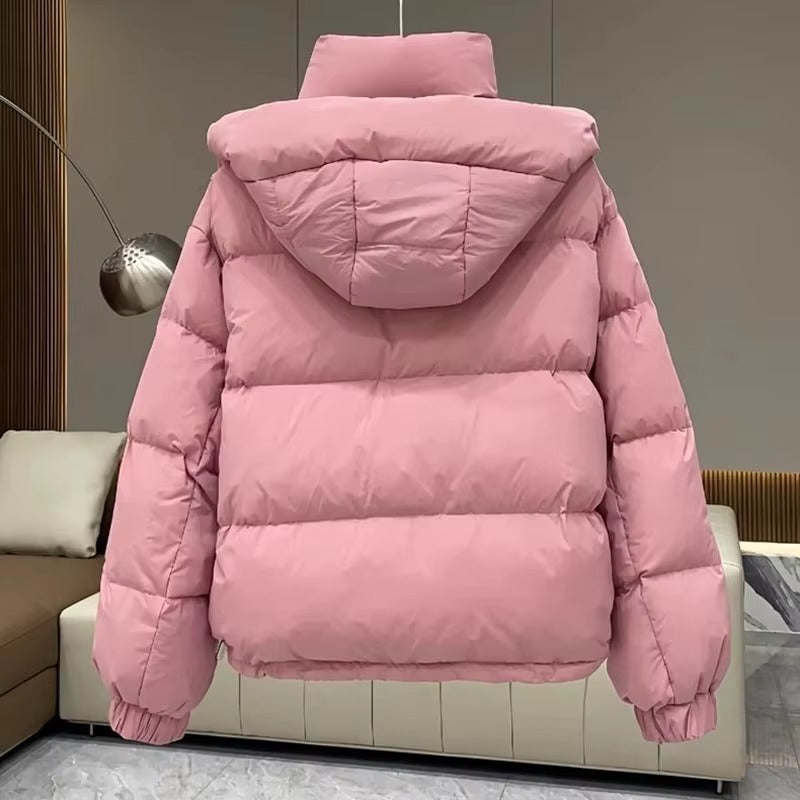 Women's puffer jacket with a stand collar and insulated hood for extreme cold