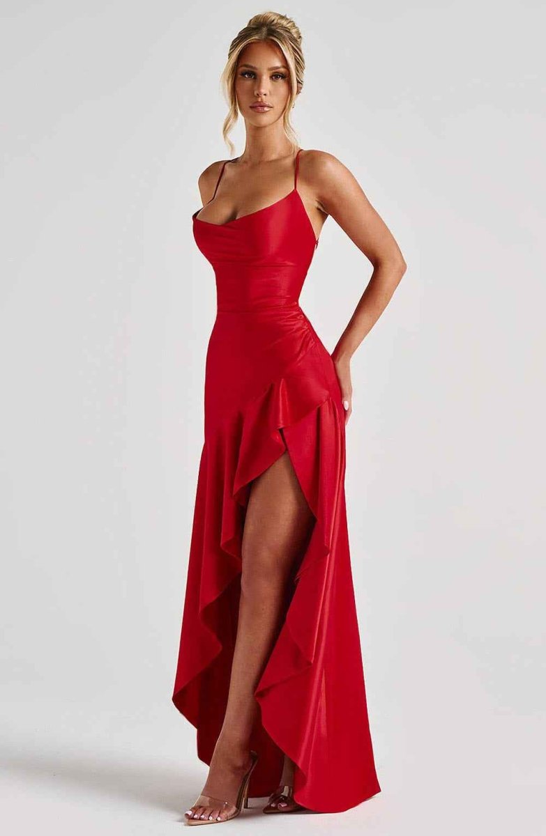Women's maxi dress with thin straps, ruffled hem, and romantic style