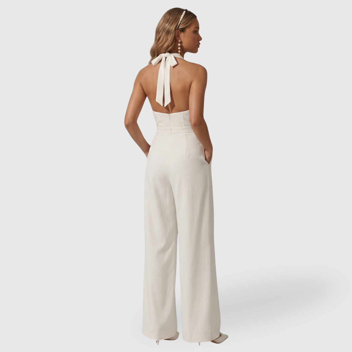 Combinaison femme pantalon col plongeant sans manches taille marquée coupe large