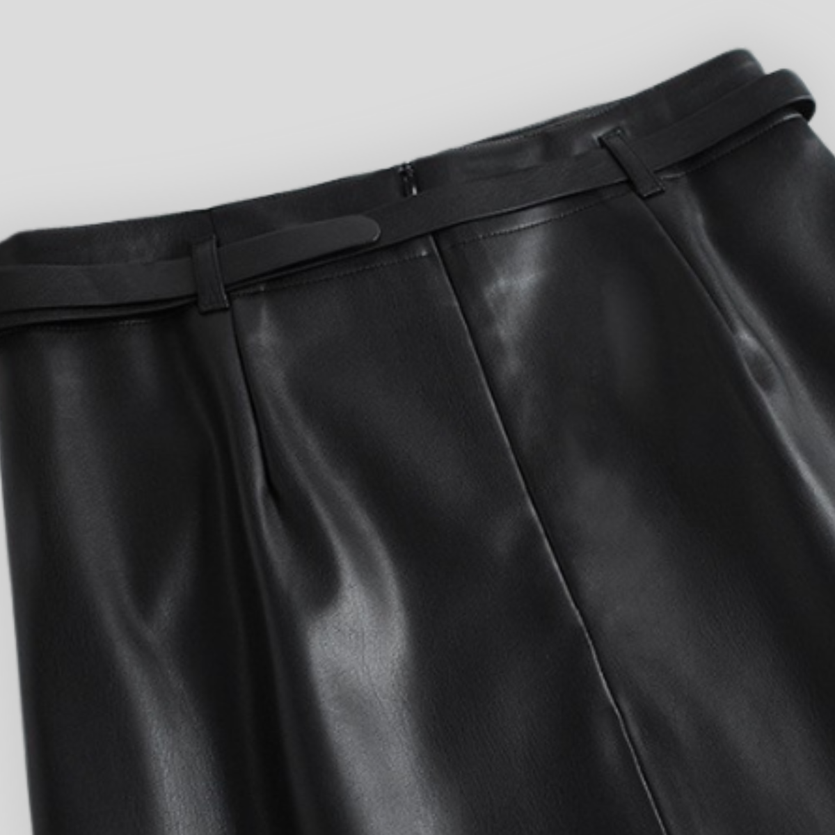 Women's high-waisted faux leather skirt with buckle belt