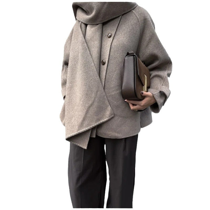 Women's oversized casual winter jacket with hood and front button closure