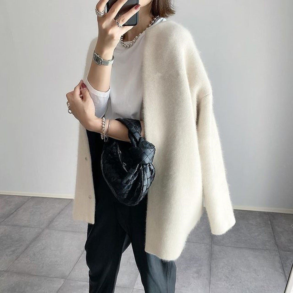Elegant, lightweight, warm women's cashmere cardigan with refined style