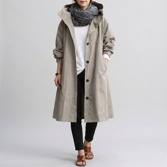Women's hooded raincoat with elasticated cuffs