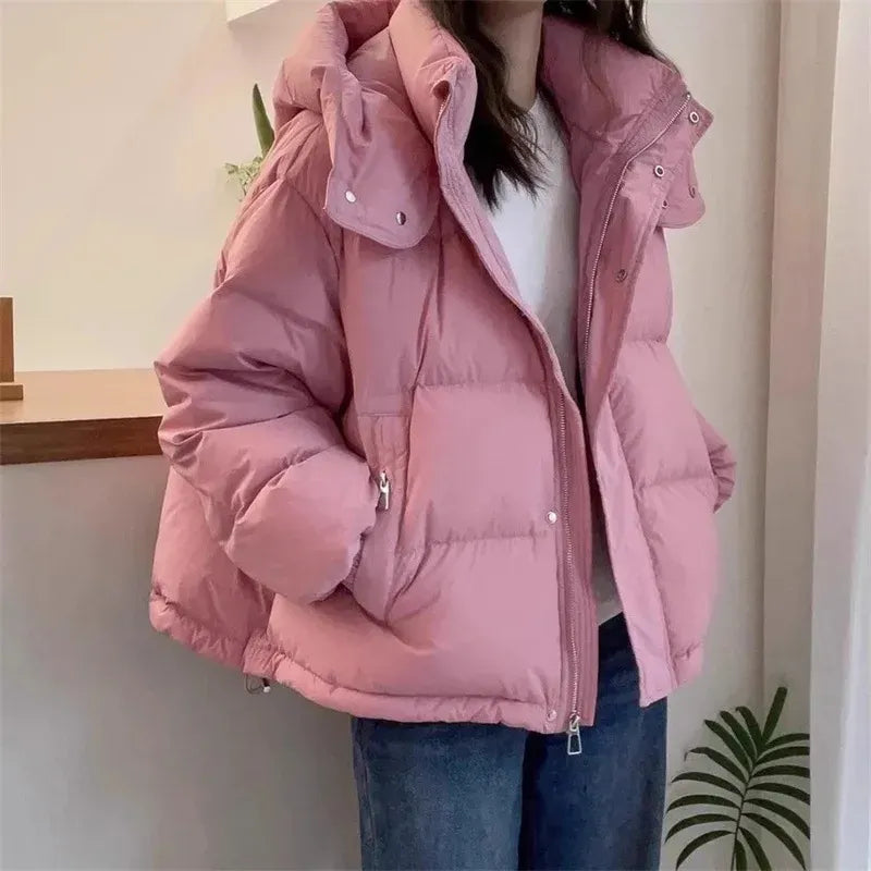 Women's puffer jacket with a stand collar and insulated hood for extreme cold
