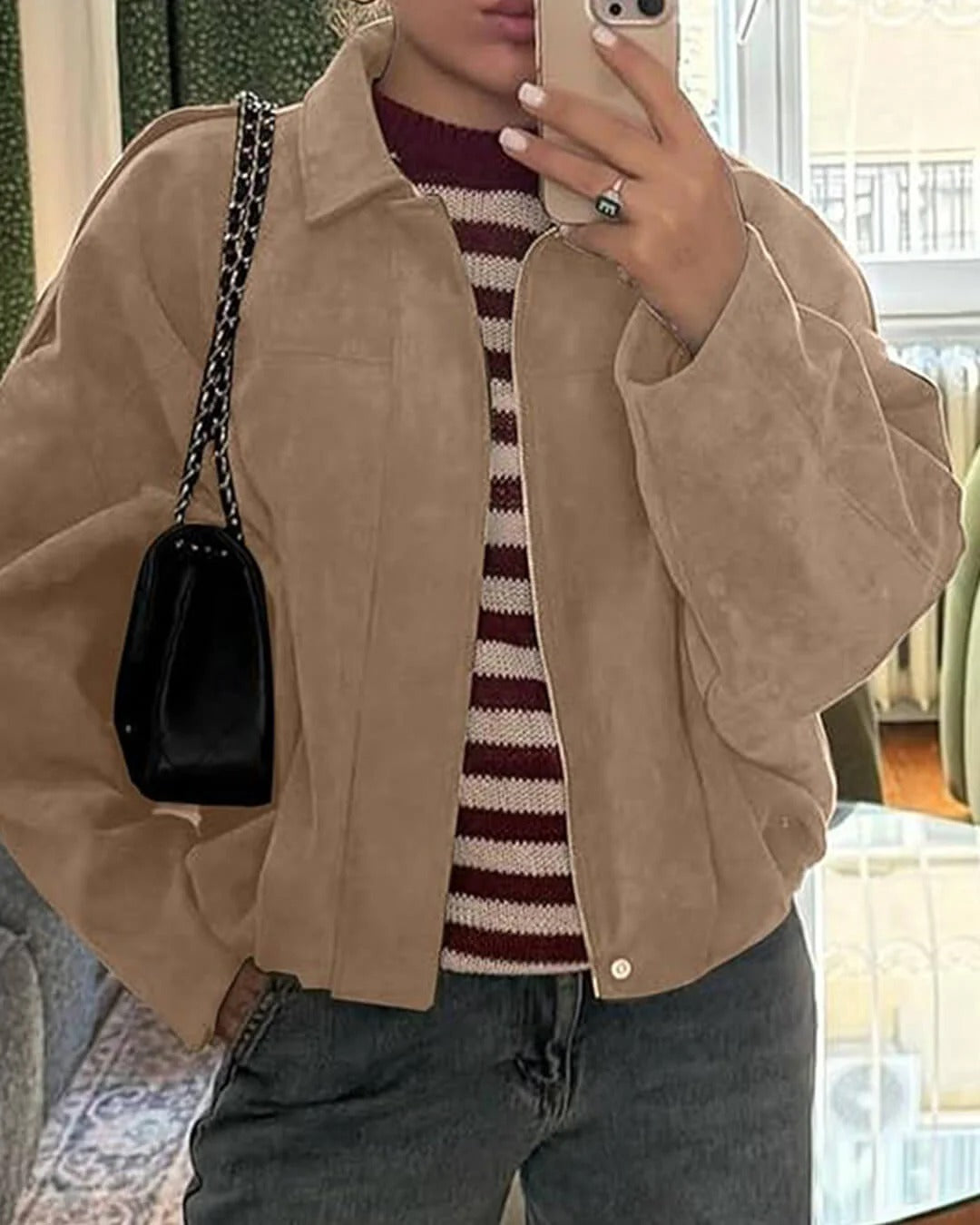 Bomber femme faux daim col structuré finition mate élégante