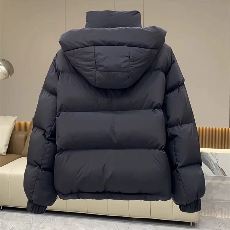 Women's puffer jacket with a stand collar and insulated hood for extreme cold