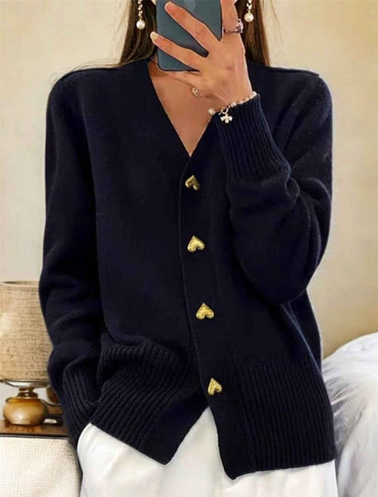 Women’s button-front cardigan with clean lines, a classic cut, and a winter style